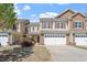 Inviting two-story home with red shutters, tidy landscaping, and a spacious two-car garage at 225 Mayfield Dr, Apex, NC 27539