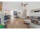 Open living space features dining area, bar seating, and seamlessly connects to a modern kitchen at 225 Mayfield Dr, Apex, NC 27539
