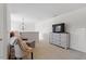 Loft area with comfortable seating and a TV at 225 Mayfield Dr, Apex, NC 27539