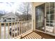 View from the balcony showing the community and sliding doors allowing light to come in at 2421 Kudrow Ln, Morrisville, NC 27560