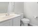 Bathroom with a shower-tub combination, toilet, and vanity with a large mirror at 2421 Kudrow Ln, Morrisville, NC 27560