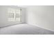 Bright and airy bedroom with a large window offering plenty of natural light at 2421 Kudrow Ln, Morrisville, NC 27560