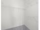 Walk-in closet with white wire shelving provides ample storage space at 2421 Kudrow Ln, Morrisville, NC 27560