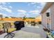 Outdoor patio area with comfortable seating and a grill, perfect for outdoor entertaining and relaxation at 25 Cornfield Ln, Benson, NC 27504