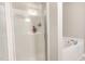 Bright bathroom with a glass enclosed shower and separate soaking tub at 25 Cornfield Ln, Benson, NC 27504