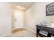 Warm foyer welcomes with neutral walls, carpeted floors, and a console table showcasing decor at 25 Cornfield Ln, Benson, NC 27504
