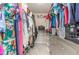 Spacious walk-in closet with custom shelving and plenty of storage for clothes and accessories at 25 Cornfield Ln, Benson, NC 27504