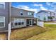 Home exterior showcasing screened-in porch and fenced yard at 2528 Forge Village Way, Apex, NC 27523