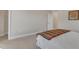 Bright bedroom featuring neutral walls, and an area rug on carpeted floors at 2528 Forge Village Way, Apex, NC 27523