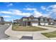 Street view of modern two-story homes with well-manicured lawns and attached garages at 2528 Forge Village Way, Apex, NC 27523