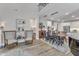 Open concept with living room, dining room, and kitchen with high ceilings at 2528 Forge Village Way, Apex, NC 27523