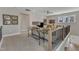 Cozy loft area features carpet flooring, neutral colors, and plenty of seating at 2528 Forge Village Way, Apex, NC 27523