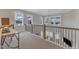 Loft overlook showcases the open floor plan, natural light, and community views at 2528 Forge Village Way, Apex, NC 27523