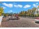 Well-equipped playground with colorful play structures and wood chip ground for safety at 2528 Forge Village Way, Apex, NC 27523