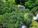 Aerial view of lush, green landscape, showcasing the tree coverage at 2901 Hunters Bluff Dr, Raleigh, NC 27606
