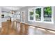 Open concept dining room and kitchen features hardwood floors and natural light at 2901 Hunters Bluff Dr, Raleigh, NC 27606