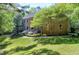 Beautiful two-story brick home with mature landscaping and inviting backyard at 2901 Hunters Bluff Dr, Raleigh, NC 27606