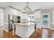 Bright kitchen features a large island with granite countertops, stainless steel appliances, and ample cabinet space at 2901 Hunters Bluff Dr, Raleigh, NC 27606