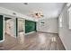 Spacious basement featuring wood-look laminate flooring and plenty of natural light at 2904 Falkirk Pl, Raleigh, NC 27604