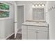 Well-lit bathroom featuring a vanity with granite countertop at 2904 Falkirk Pl, Raleigh, NC 27604