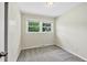 Bedroom featuring carpet and ample natural light from two windows at 2904 Falkirk Pl, Raleigh, NC 27604
