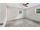 Bedroom featuring carpet, natural light, ceiling fan, and neutral color scheme at 2904 Falkirk Pl, Raleigh, NC 27604