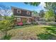 Lovely home exterior with a covered porch, brick accents, and a well-maintained lawn at 2904 Falkirk Pl, Raleigh, NC 27604