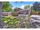 A charming home with a welcoming front porch, lush greenery, and a well-kept lawn at 2904 Falkirk Pl, Raleigh, NC 27604