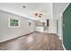 Bright, spacious living room with vinyl floors, natural light, and updated finishes at 2904 Falkirk Pl, Raleigh, NC 27604