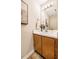 Bathroom with large mirror, updated fixtures, neutral walls, and stylish decor at 3 Little Stone Cir, Durham, NC 27703