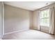 Neutral bedroom with large window and ample natural light at 3 Little Stone Cir, Durham, NC 27703