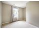 Cozy bedroom features neutral walls and carpet with natural light at 3 Little Stone Cir, Durham, NC 27703