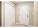 Hallway with neutral carpet, white doors, and fresh paint at 3 Little Stone Cir, Durham, NC 27703