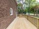 Spacious wooden deck with railings, perfect for outdoor entertaining and relaxation at 301 Trappers Sack Rd, Cary, NC 27513