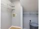 Bright laundry area with wire shelving and hookups, ready for appliances at 301 Trappers Sack Rd, Cary, NC 27513