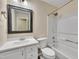 Well-lit bathroom with vanity, toilet, and shower-tub combination at 3116 Henslowe Dr, Raleigh, NC 27603