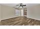 Well-lit bedroom with hardwood floors and natural light at 3116 Henslowe Dr, Raleigh, NC 27603