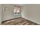 Cozy bedroom with hardwood floors, a window, and fresh paint at 3116 Henslowe Dr, Raleigh, NC 27603