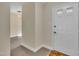 Inviting foyer featuring tile flooring, neutral paint, and a view into adjoining room at 3116 Henslowe Dr, Raleigh, NC 27603