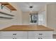 Kitchen island with butcher block countertop, featuring two rows of drawers at 3116 Henslowe Dr, Raleigh, NC 27603