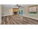 Open living room featuring a fireplace and access to the deck, perfect for entertaining at 3116 Henslowe Dr, Raleigh, NC 27603