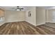 Spacious living room with modern wood floors, neutral paint and ample natural light at 3116 Henslowe Dr, Raleigh, NC 27603