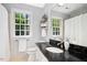 Bathroom featuring a combination shower and bath and granite countertop at 3117 Woodgreen Dr, Raleigh, NC 27607