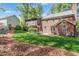 Brick two-story home with well-kept backyard and patio at 3117 Woodgreen Dr, Raleigh, NC 27607