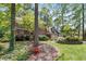 Traditional brick home with well-manicured front yard at 3117 Woodgreen Dr, Raleigh, NC 27607