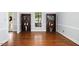 Bright living room with hardwood floors and built-in bookshelves at 3117 Woodgreen Dr, Raleigh, NC 27607