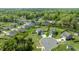 Suburban neighborhood aerial view showcases a home with mature trees at 312 Loon Ct, Graham, NC 27253
