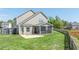 Expansive backyard with screened-in porch perfect for outdoor entertaining at 312 Loon Ct, Graham, NC 27253