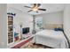 Cozy bedroom with a comfortable bed, stylish decor, and natural light at 312 Loon Ct, Graham, NC 27253
