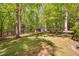 View of backyard features storage shed and picnic table at 3312 Shannon Cir, Apex, NC 27539